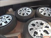  4x100 lyukosztású 15" újszerű (gyári felni) lemezfelni, rajta 185/65 