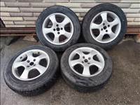  4x98 lyukosztású 15" használt (gyári felni) alufelni, rajta 195/65 használt Bridgestone téli gumi 