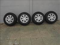  5x114.3 lyukosztású 16" újszerű Enzo alufelni, rajta 215/70 használt Bridgestone téli gumi gumi 