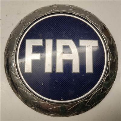 214272 Fiat Grande Punto, Stilo, Croma, Multipla, Doblo II. kék színű első embléma 98 mm átmérő , rögzítőcsavar törött!!! 46832366