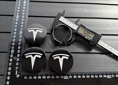 TESLA 56mm FELNI ALUFELNI KUPAK KÖZÉP FELNIKÖZÉP FELNIKUPAK EMBLÉMA JEL KERÉKAGY PORVÉDŐ 600587900A