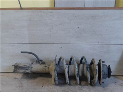 SUZUKI SWIFT 89-96 Bal első lengéscsillapító rugóval