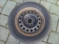  4x100 lyukosztású 14" használt lemezfelni, rajta 185/70 eldobós Bridgestone téli gumi gumi 