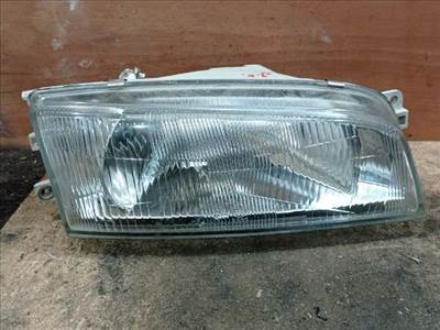 Mitsubishi Lancer V Jobb Fényszóró *141052*