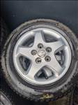  5x114.3 lyukosztású 15" használt Mazda alufelni, rajta 195/65 használt Pirelli téli gumi 
