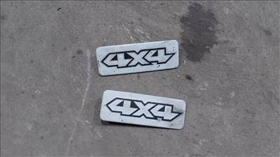 Nissan Terrano WD21 87- Oldalsó 4x4 felirat jelvény embléma jel 8311