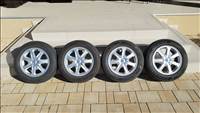  4x100 lyukosztású 15" használt alufelni, rajta 185/65 használt Royal Black nyári gumi gumi 