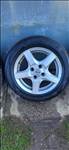  4x100 lyukosztású 15" használt Enzo alufelni, rajta 185/65 használt Hankook téli gumi gumi 