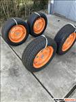  4x100 lyukosztású 14" felújított lemezfelni, rajta 195/60 új Riken nyári gumi gumi 
