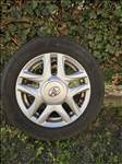  15" újszerű (gyári felni) alufelni, rajta 175/65 használt Hankook négyévszakos gumi 
