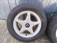 4x100 lyukosztású 14" használt alufelni, rajta 185/65 újszerű Sava nyári gumi gumi 