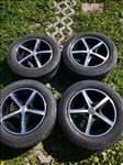  5x110 lyukosztású 15" újszerű Dezent alufelni, rajta 205/60 kopott Falken nyári gumi gumi 
