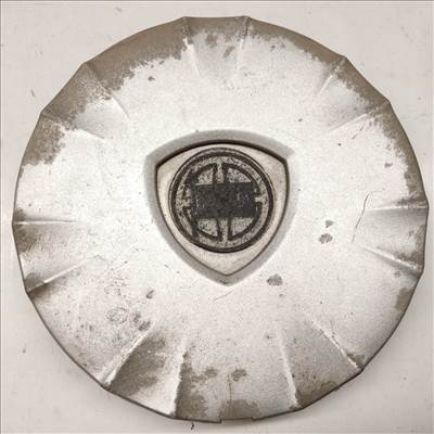 105399 Lancia Ypsilon II. 2003-2011 felni közép kupak, a képen látható állapotban 51708375