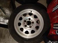  5x120 lyukosztású 15" újszerű BMW style 34 alufelni, rajta 195/65 eldobós Continental nyári gumi