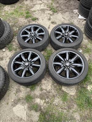  4x100 lyukosztású 17" használt (gyári felni) alufelni, rajta 205/45 kopott Bridgestone nyári gumi 