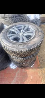  5x100 lyukosztású 16" újszerű alufelni, rajta 205/70 újszerű Michelin téli gumi gumi 