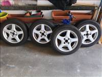  15" újszerű Enzo alufelni, rajta 185/60 újszerű Laufenn nyári gumi gumi 