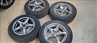  Ford 14" használt felni, rajta használt gumi 