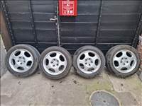  5x112 lyukosztású 16" használt (gyári felni) alufelni, rajta 215/55 kopott Hankook nyári gumi gumi 