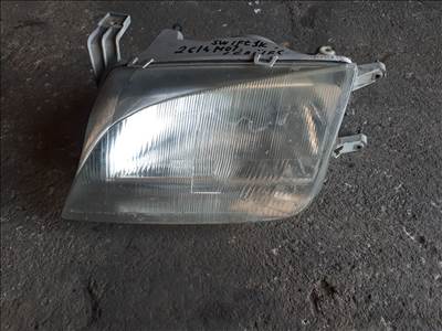 Suzuki Swift III 2000, bal első lámpa, fényszóró nem hibátlan 