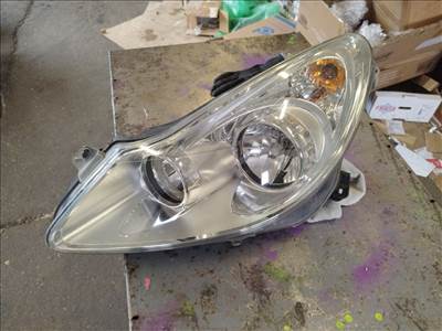 Opel Corsa D 2006-2010 bal fényszóró - alsó füle törött 13186381