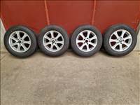  5x114.3 lyukosztású 16" használt RC alufelni, rajta 215/65 újszerű Falken téli gumi