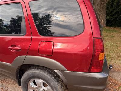 Mazda Tribute bal hátsó sárvédő 