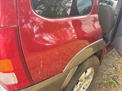 Mazda Tribute jobb hátsó sárvédő 