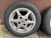  4x108 lyukosztású 13" használt Titan alufelni, rajta 165/65 használt nyári gumi 4 db