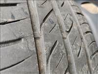  4x108 lyukosztású 15" használt lemezfelni, rajta 195/65 használt Firestone nyári gumi gumi 