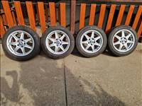  5x114.3 lyukosztású 16" alufelni, rajta 205/55 használt Continental téli gumi