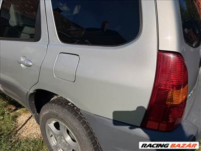 Mazda Tribute 2.0B bal hátsó sárvédő 