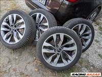  5x114.3 lyukosztású 18" használt (gyári felni), rajta 235/45 használt Continental téli gumi