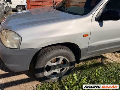 Mazda Tribute 2.0 B bal első sárvédő 