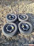  5x100 lyukosztású 14" használt (gyári felni) lemezfelni, rajta 185/60 új Hankook téli gumi gumi 
