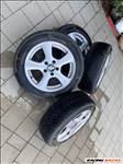  5x112 lyukosztású 16" használt OZ alufelni, rajta 205/55 kopott Hankook téli gumi gumi 